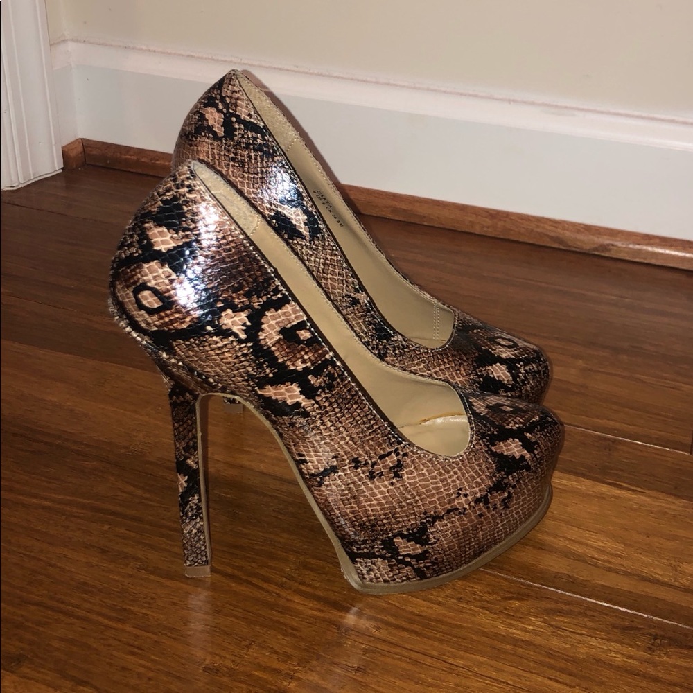 Snake print platform pumps